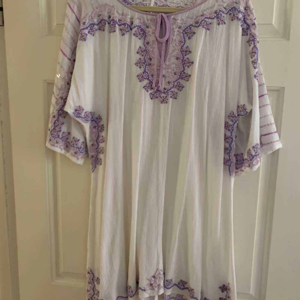 White linen dress with purple embroidery